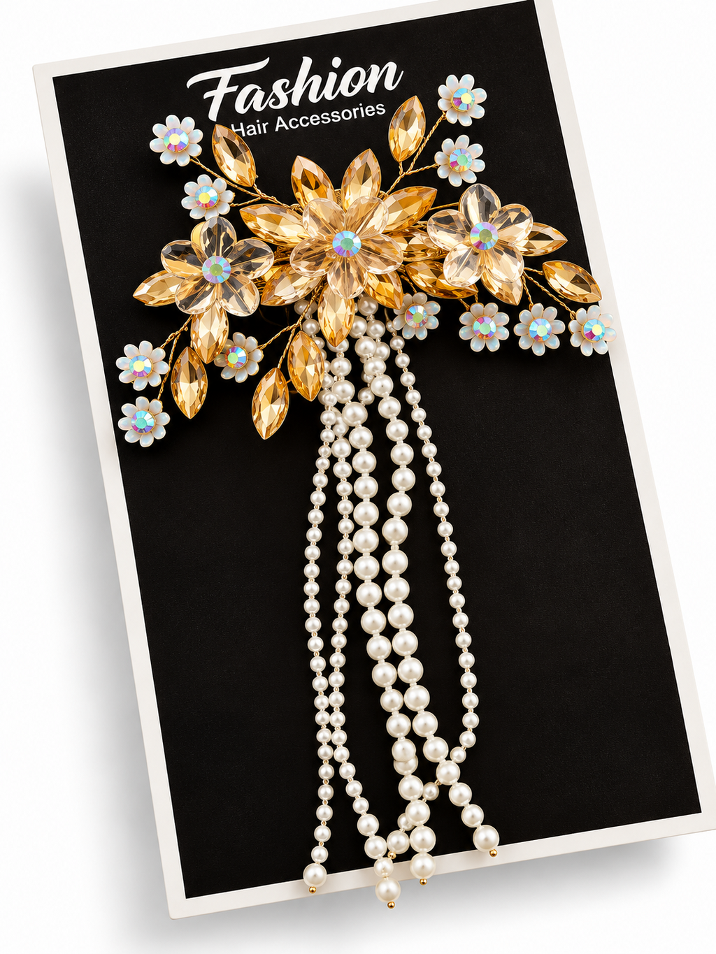 Gold floral crystal hair clip with cascading pearl strands on display card