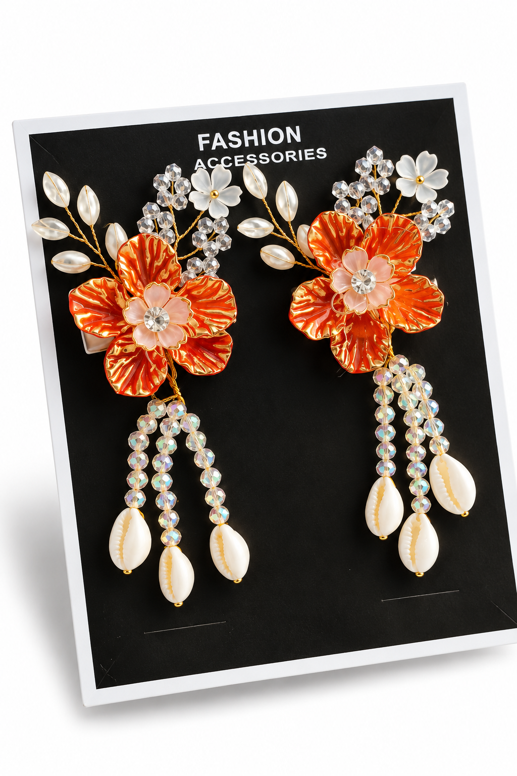 Orange floral crystal hair clip with shell dangles on product card