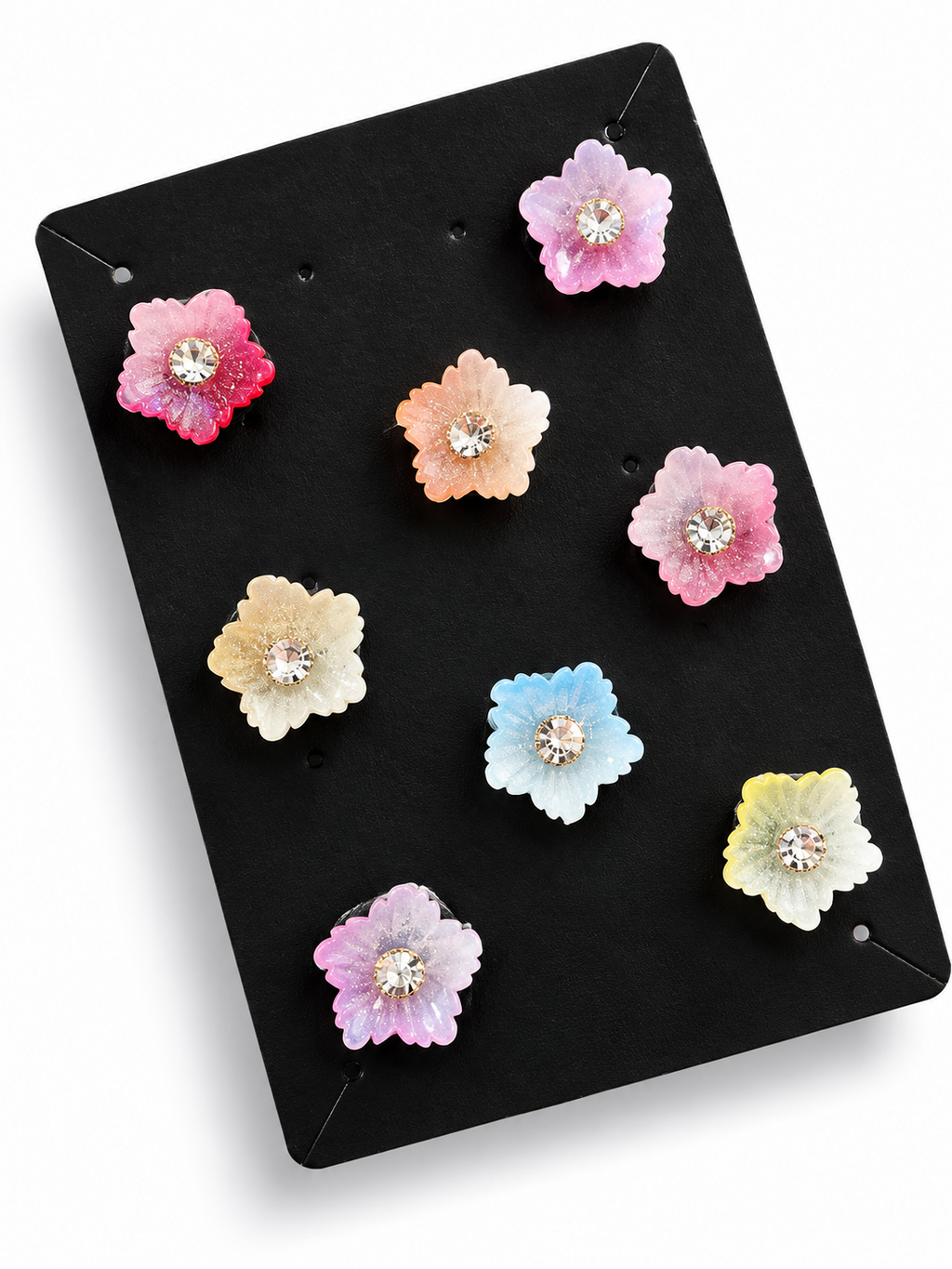 Pastel multicolour flower hair stickers with crystal centres on a black display card
