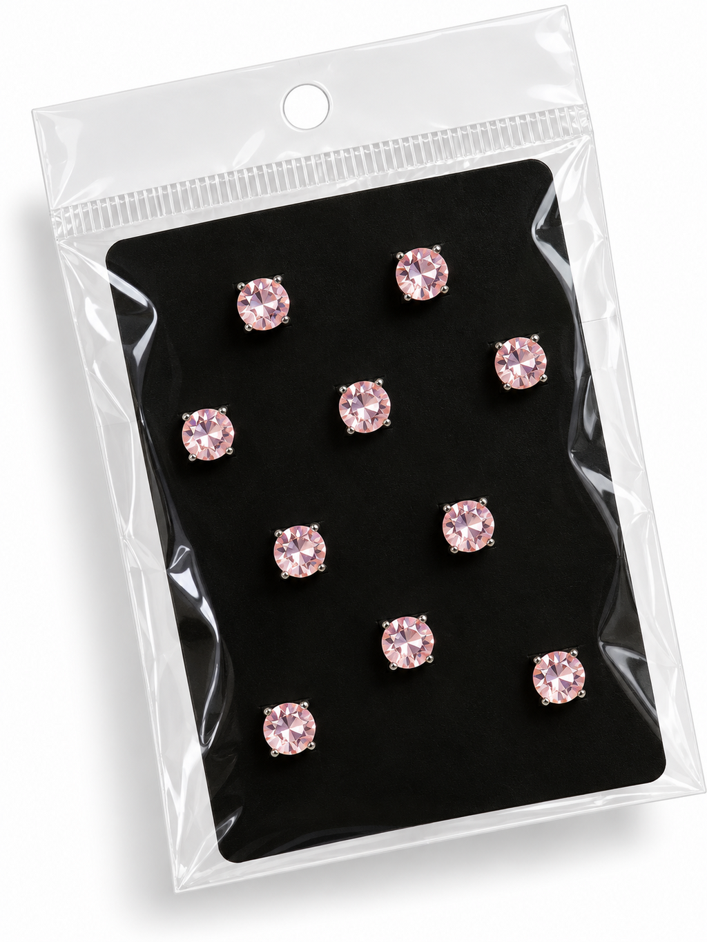 Pack of pink round rhinestone hair stickers on black backing