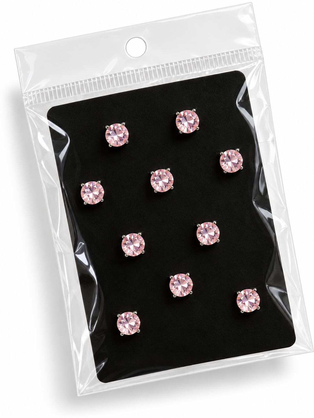 Pack of pink round rhinestone hair stickers on black backing